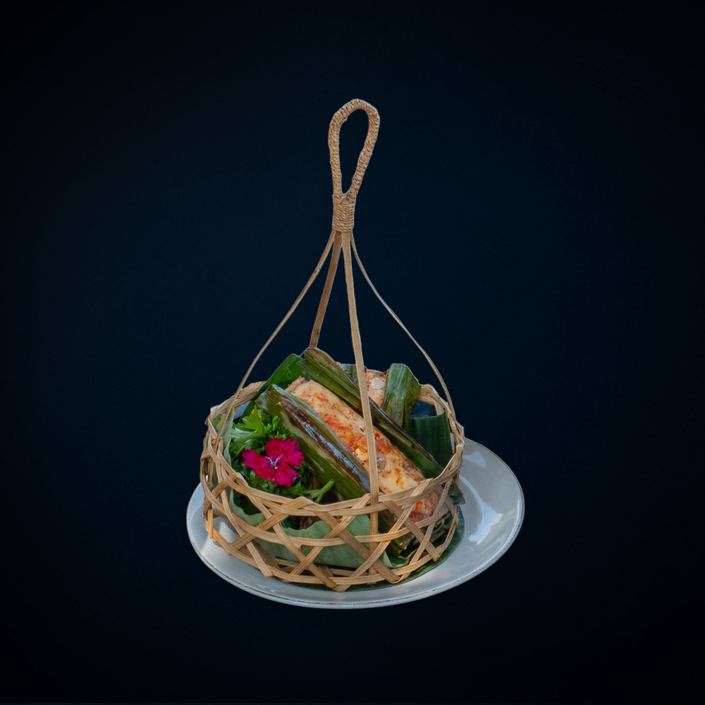 Pepes Ikan Kedonganan wrapped in banana leaf